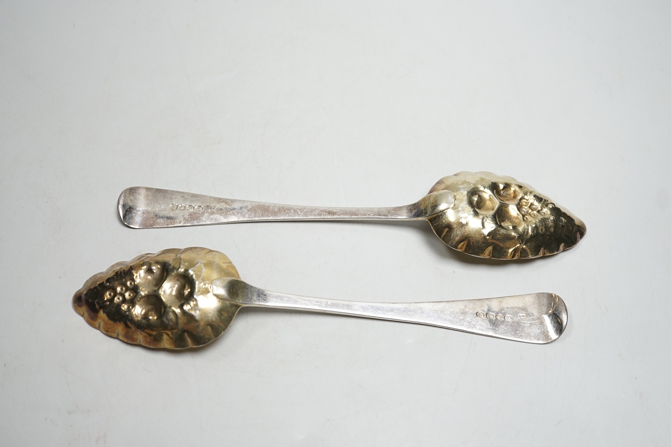 A pair of George IV silver Old English pattern 'berry' spoons, William Scofield, London, 1826, 22.5cm, 4.1oz.
